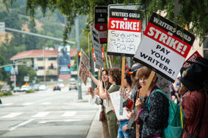 Warner Bros_-Our-Flag-Means-Strike-crowd-holds-the-line.jpg